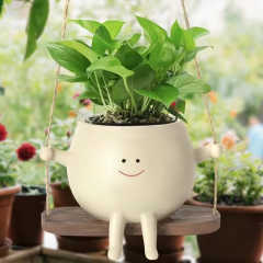 Wholesale of ceramic flower pots with swing-shaped figurines