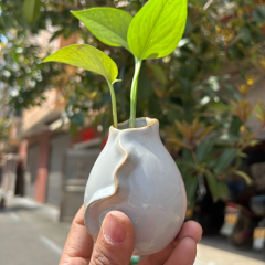 Wholesale ceramic flower vases with lotus leaf lace design