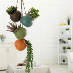 Wholesale of Seriated Ceramic Hanging Flower Pots with Rope Strands