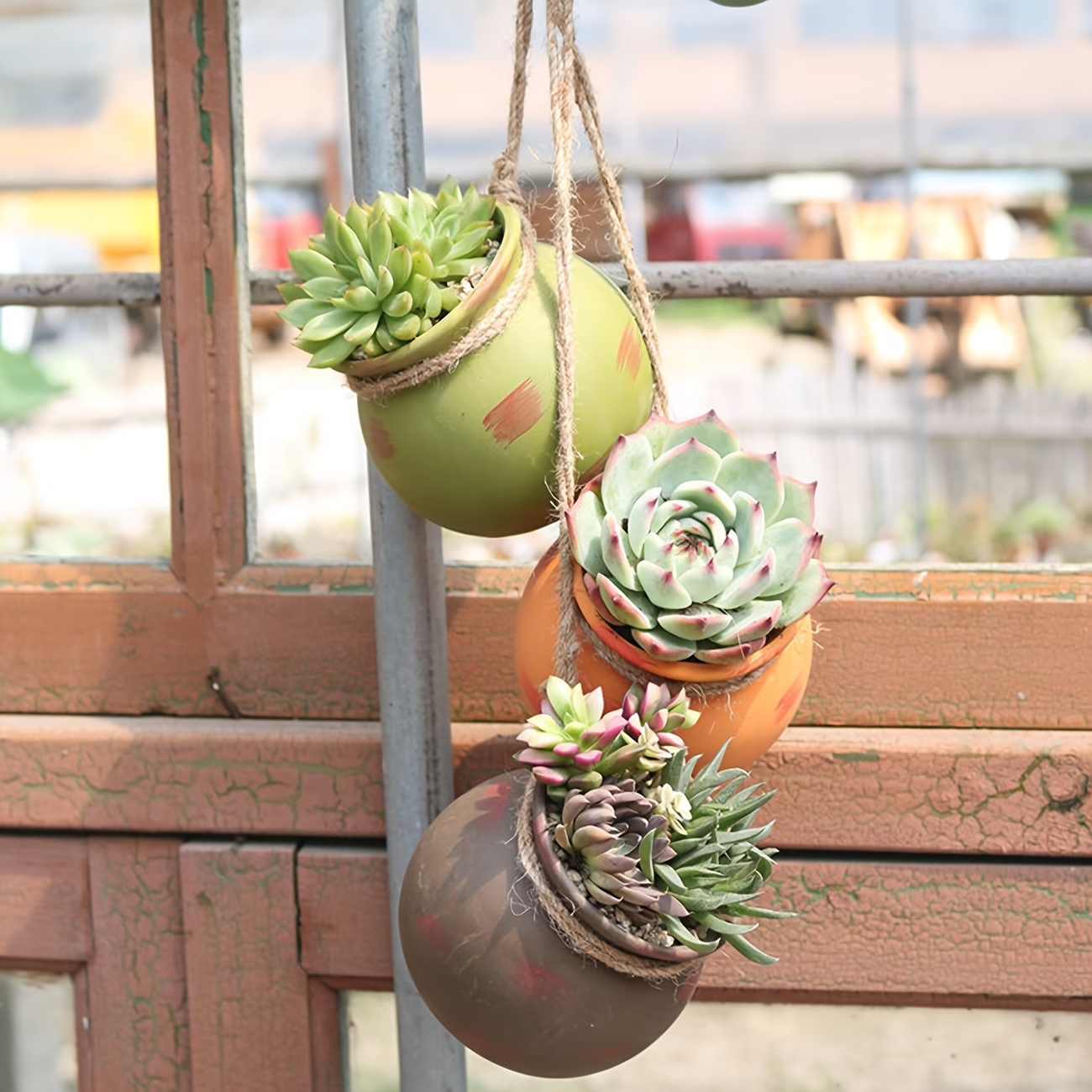 Wholesale of Seriated Ceramic Hanging Flower Pots with Rope Strands