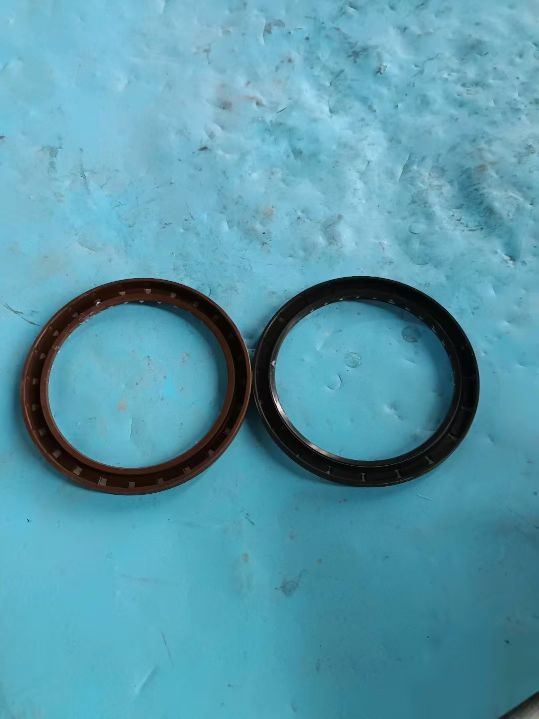 Composite frame oil seal