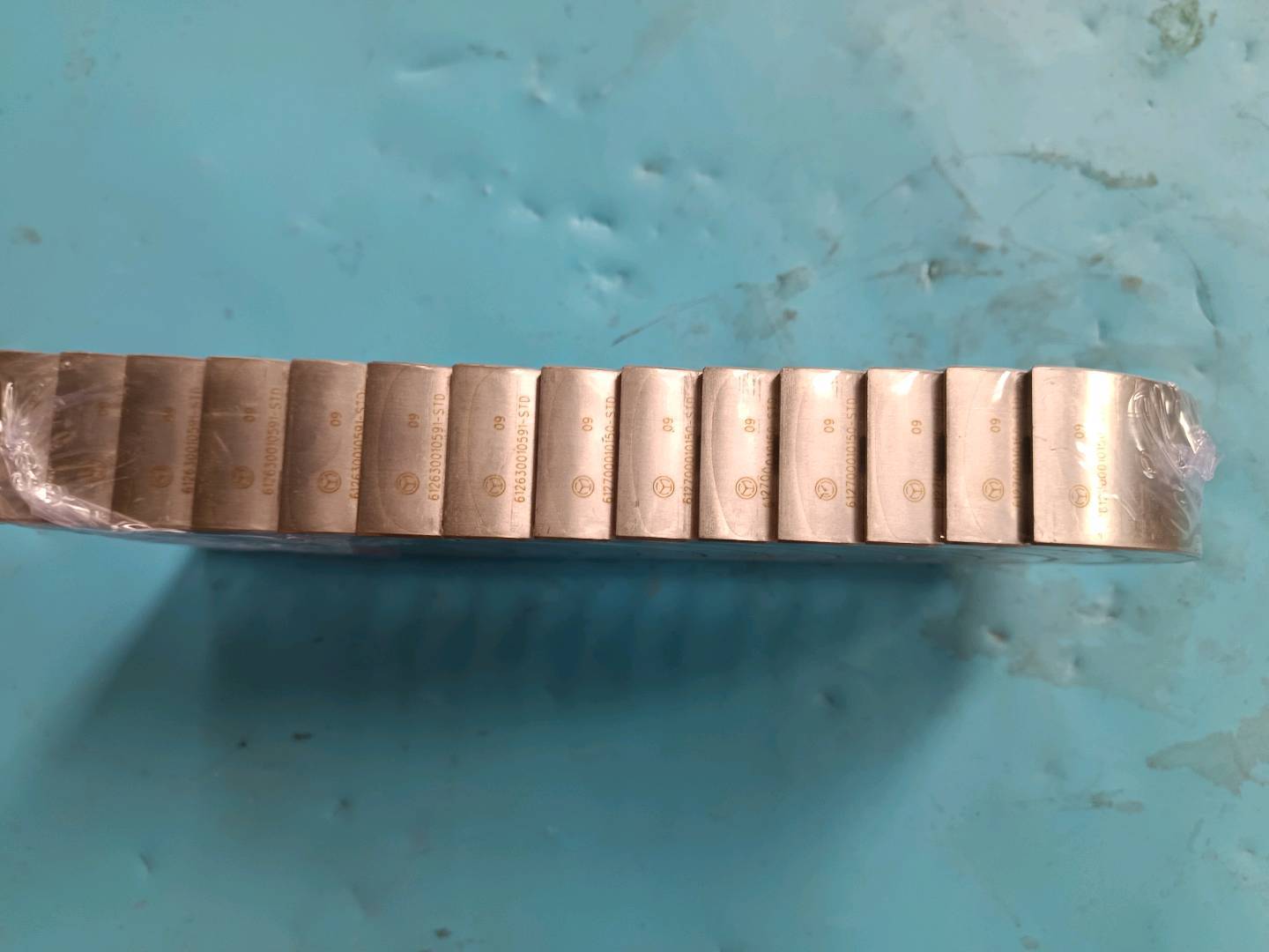 Main bearing lower bearing plate