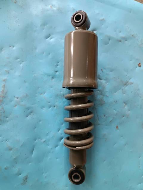 Rear suspension shock absorber assembly