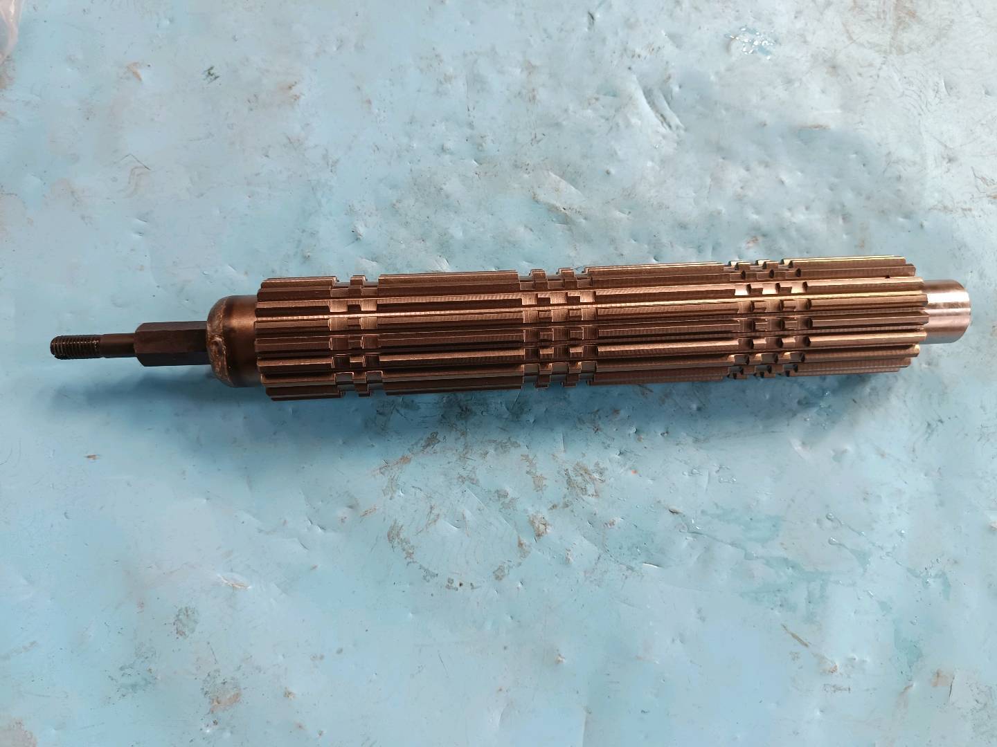 Main shaft with ball head assembly