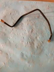 Range guard formed hose assembly