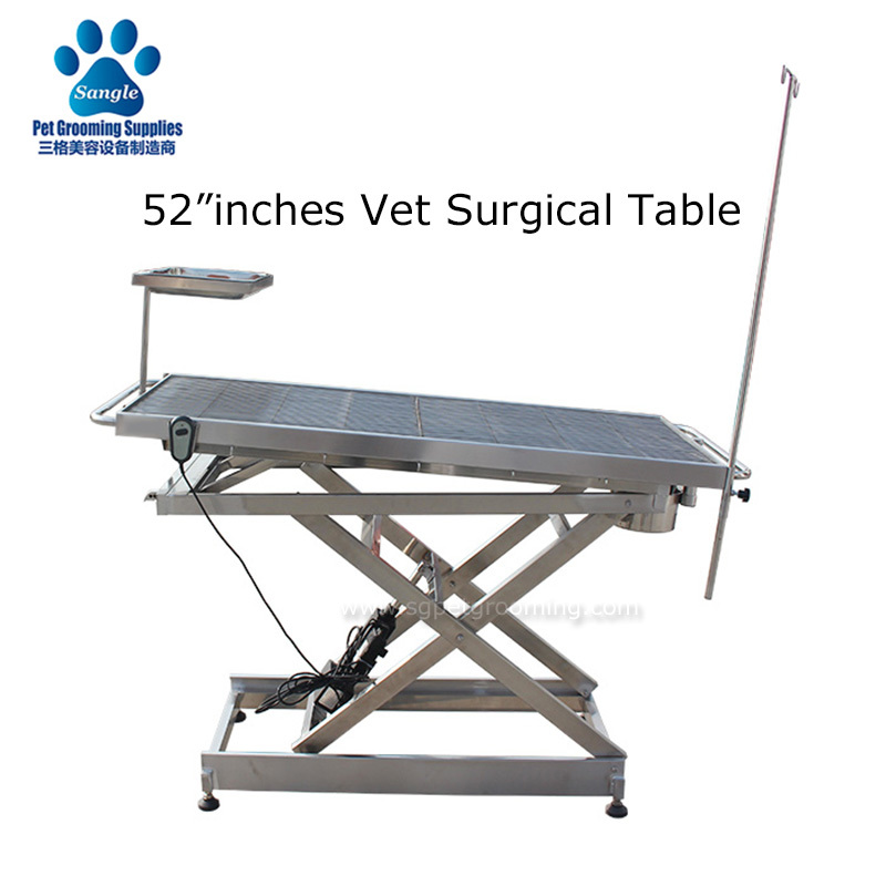 Mesa cirúrgica veterinária com grelha em aço inoxidável e elevação elétrica.