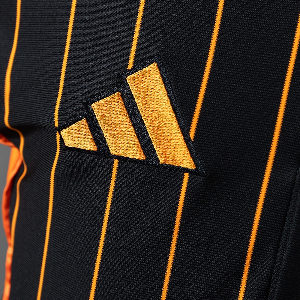 2025-26 REAL MADRID BLACK AND ORANGE US PACK FAN VERSION