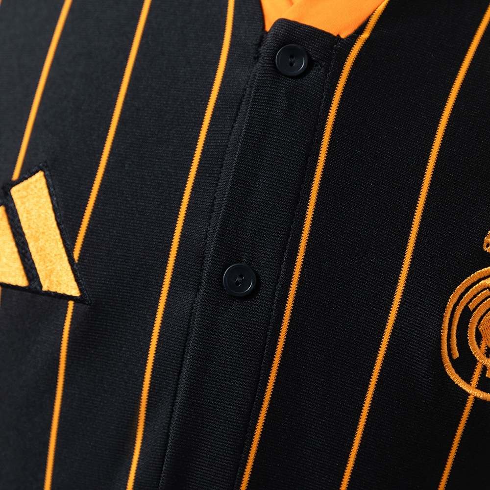 2025-26 REAL MADRID BLACK AND ORANGE US PACK FAN VERSION