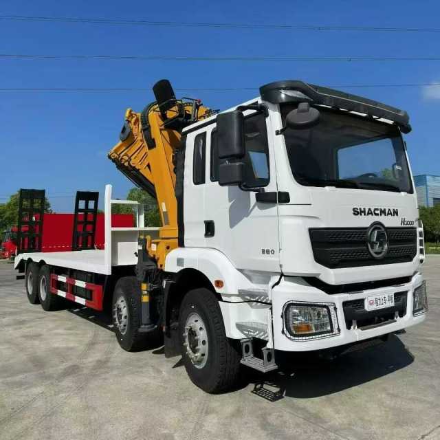 Shaanxi Auto Delong 8*4 export model flatbed transport truck with folding arm crane