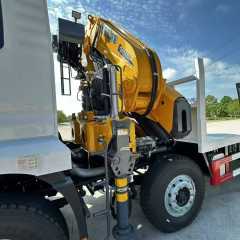 Shaanxi Auto Delong 8*4 export model flatbed transport truck with folding arm crane