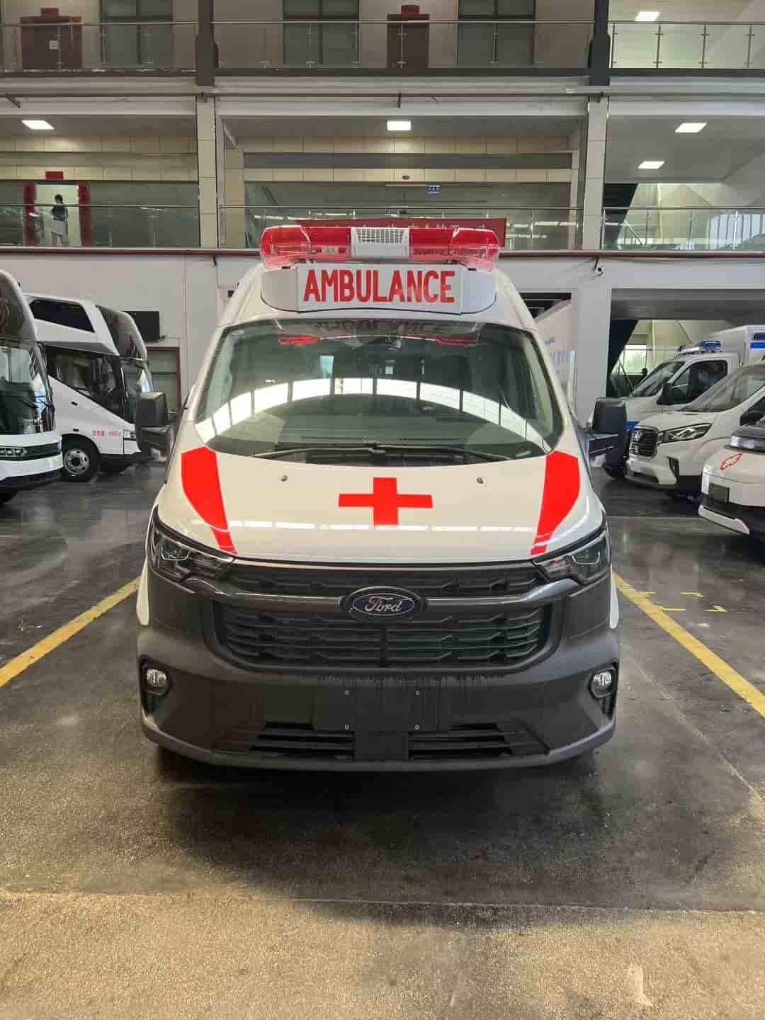 Ford National VI gasoline ambulance with raised bumper and long exhaust lights