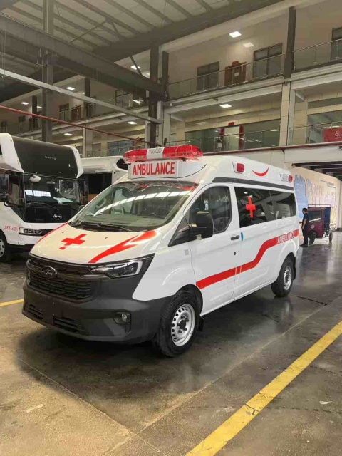 Ford National VI gasoline ambulance with raised bumper and long exhaust lights