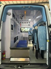 Ford National VI gasoline ambulance with raised bumper and long exhaust lights