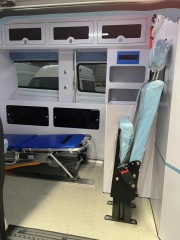 Ford National VI gasoline ambulance with raised bumper and long exhaust lights