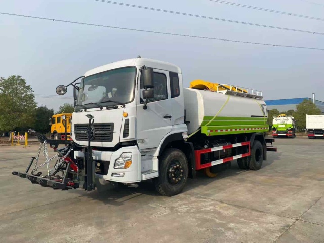 Water trucks equipped with a centrally mounted ice-breaking tool can be used in conjunction with a front-mounted snowplow.