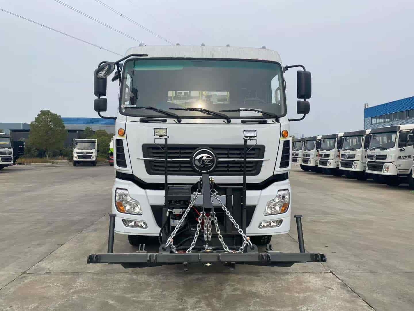 Water trucks equipped with a centrally mounted ice-breaking tool can be used in conjunction with a front-mounted snowplow.