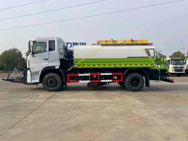Water trucks equipped with a centrally mounted ice-breaking tool can be used in conjunction with a front-mounted snowplow.