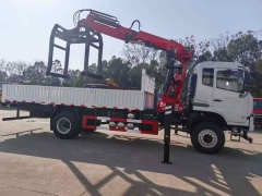 A 6.3-ton articulated boom truck with brick clamp is mounted on a Dongfeng National III 4WD chassis.