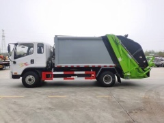 Jiefang 3.8-meter wheelbase compactor garbage truck