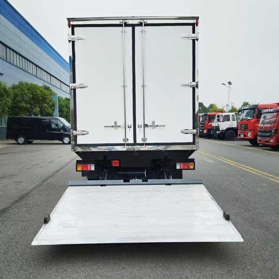 Isuzu KV600 insulated car with hydraulic tailboard
