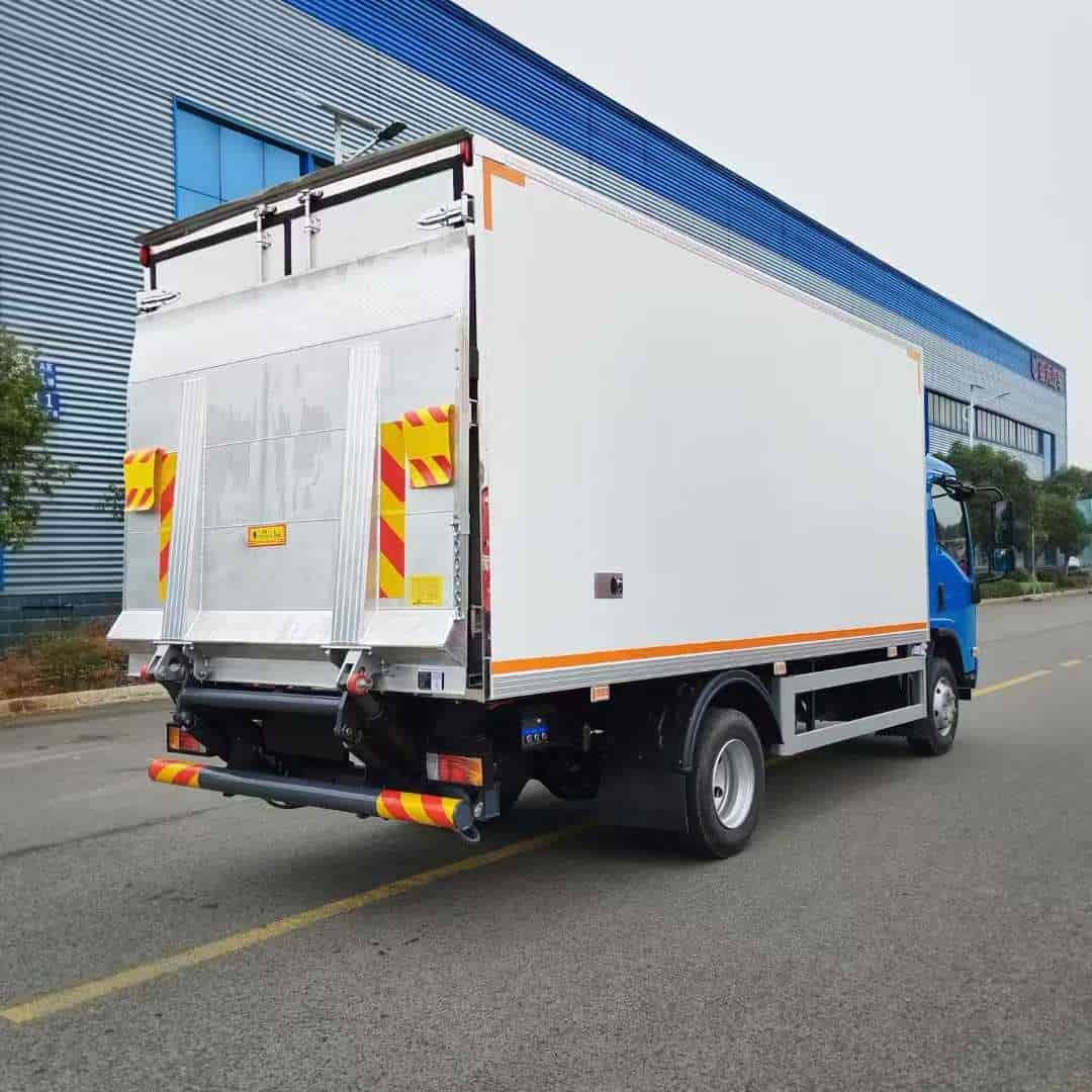 Isuzu KV600 insulated car with hydraulic tailboard
