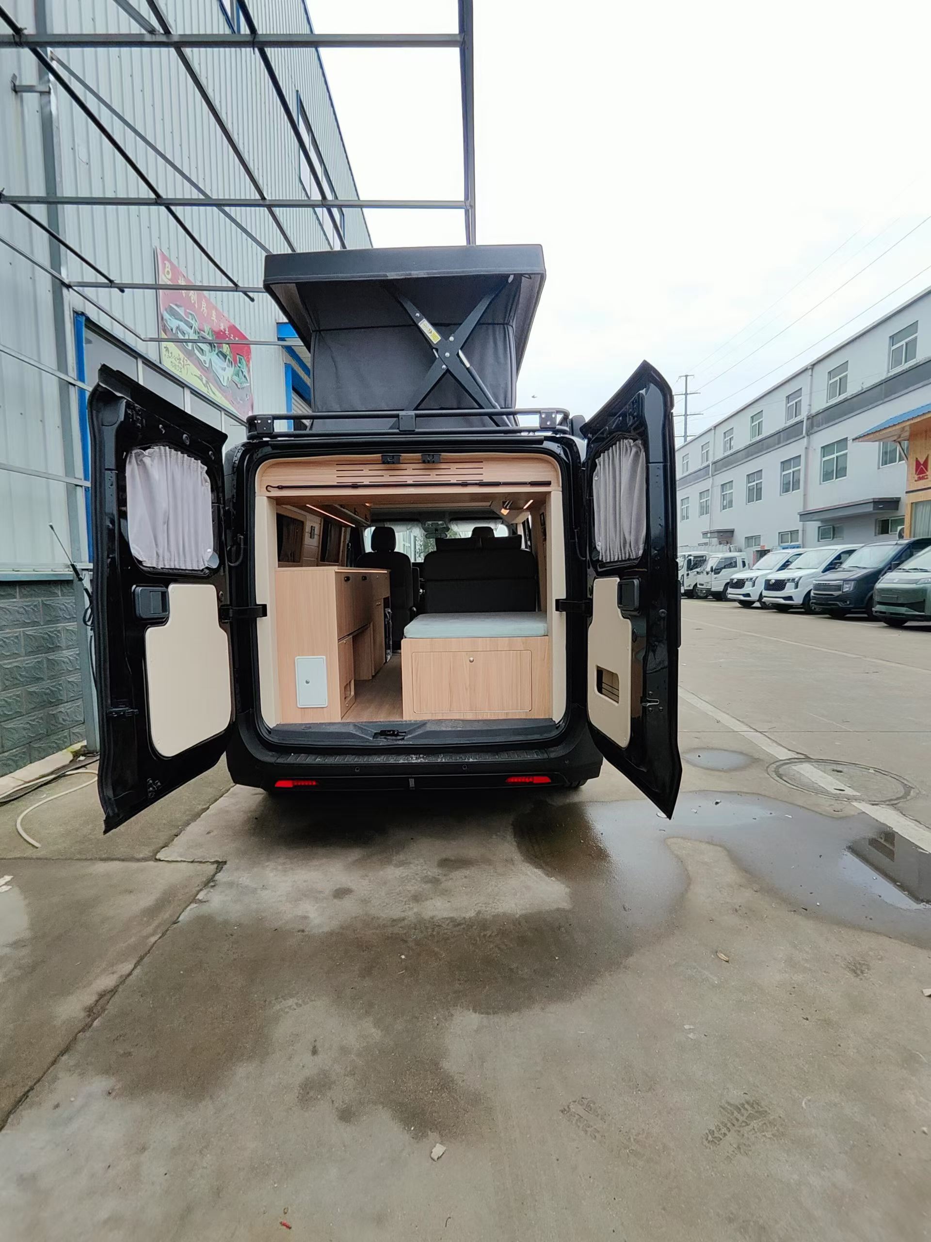 26 Black Heavy-Duty Pioneer Officer Short Axle Low Roof with Rooftop Tent Camping Vehicle