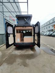 26 Black Heavy-Duty Pioneer Officer Short Axle Low Roof with Rooftop Tent Camping Vehicle