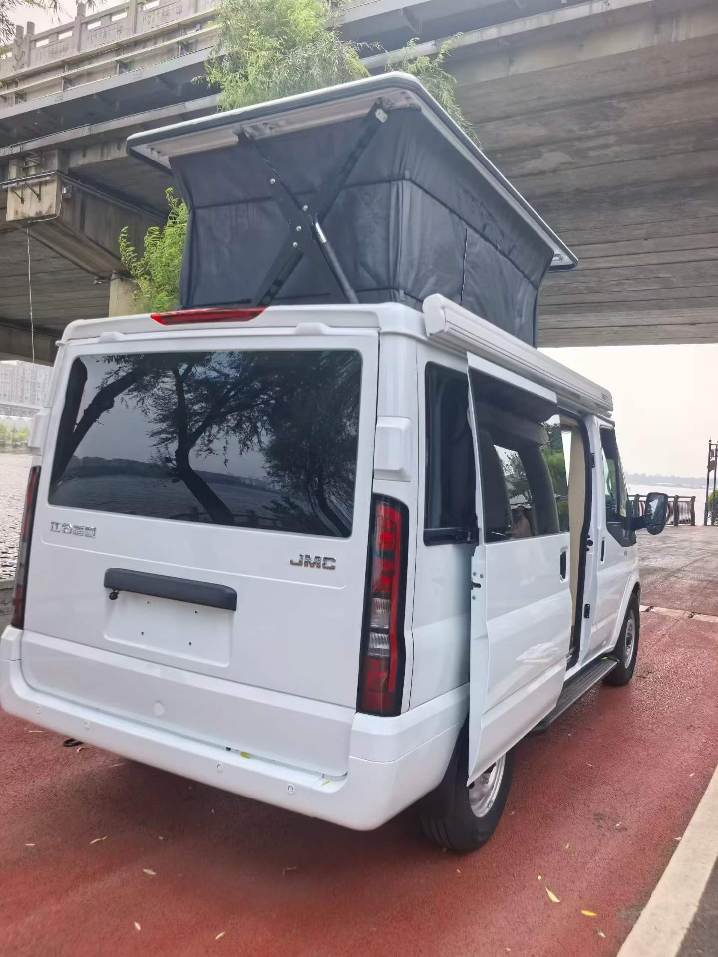 Jiangling Fushun short axis low top with raised roof small RV