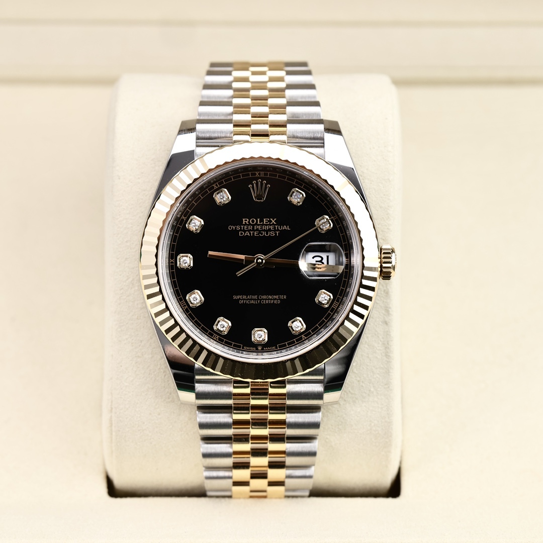 Rolex Datejust 41 mm, certificato di garanzia di gennaio 2026, quadrante nero con indici in diamanti.
