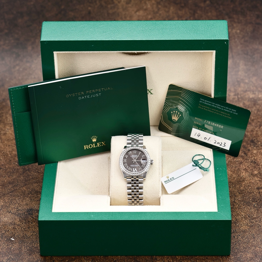 Rolex Datejust, lunetta con diamanti, numeri romani grigi, Vie diamanti, 31 mm.