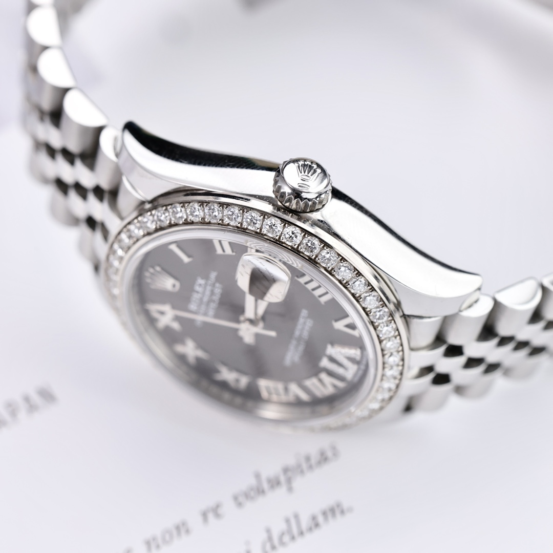 Rolex Datejust, lunetta con diamanti, numeri romani grigi, Vie diamanti, 31 mm.