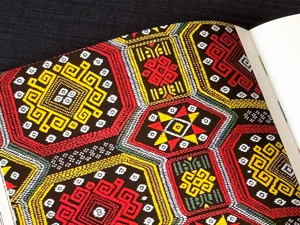 The Hidden Meanings Behind Zhuang Brocade Motifs: Symbols of Prosperity & Culture