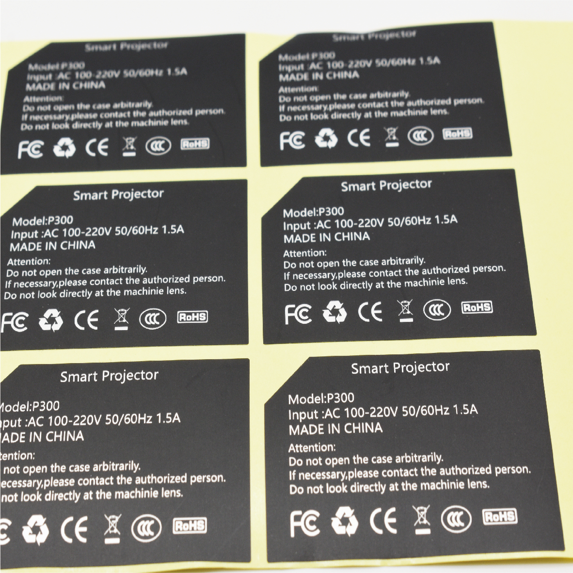 Multiple material adhesive stickers