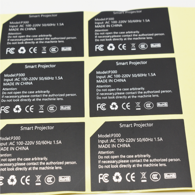 Multiple material adhesive stickers