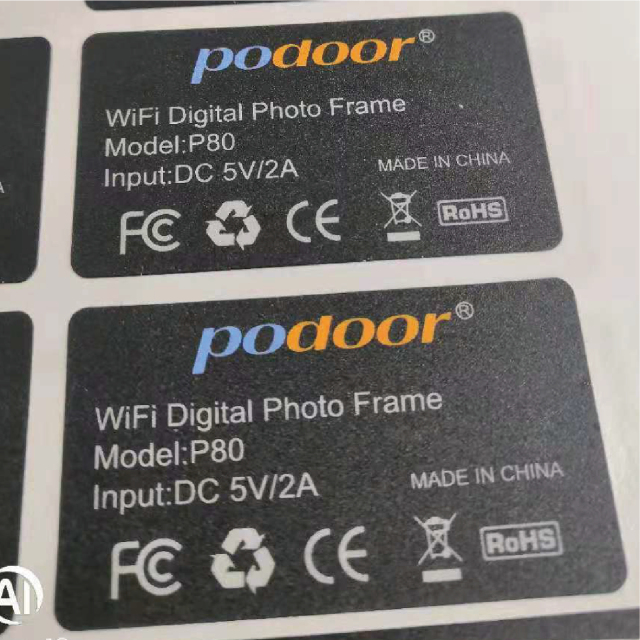 Multiple material adhesive stickers