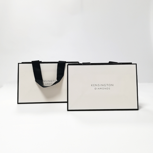 White Paper Gift Bag With Black Ribbon Handle
