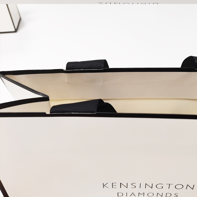 White Paper Gift Bag With Black Ribbon Handle