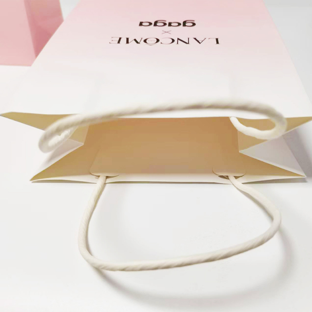 Wholesale custom printed paper shopping bag with paper twist handle