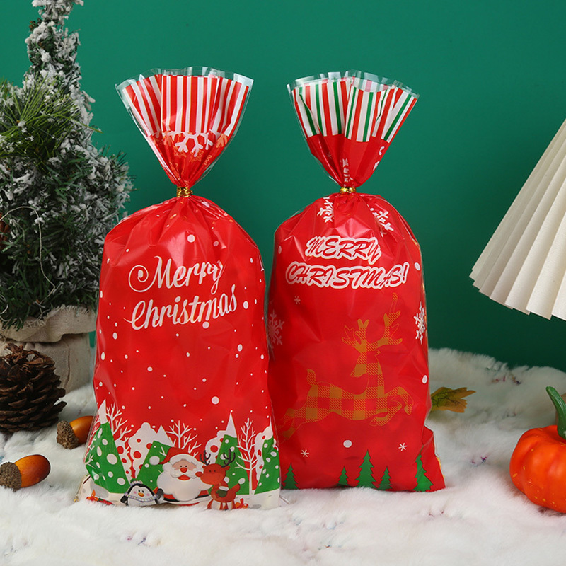 Red Santa Claus winter scene Christmas treat bag, snowflake plastic candy bag