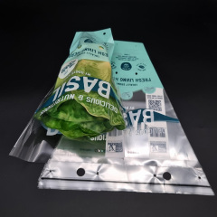 Custom printed transparent anti-fog basil herb packaging bag with breathable holes and hang tab for supermarket fresh plant display