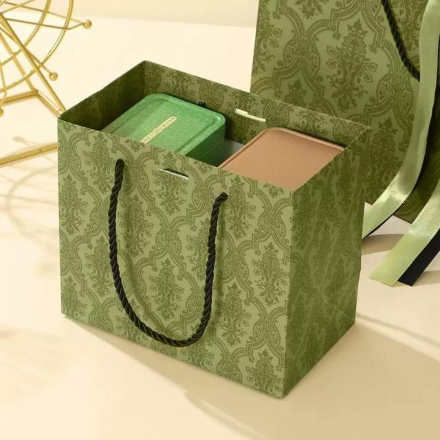 Vintage olive green patterned luxury gift paper bags with satin bow ribbon