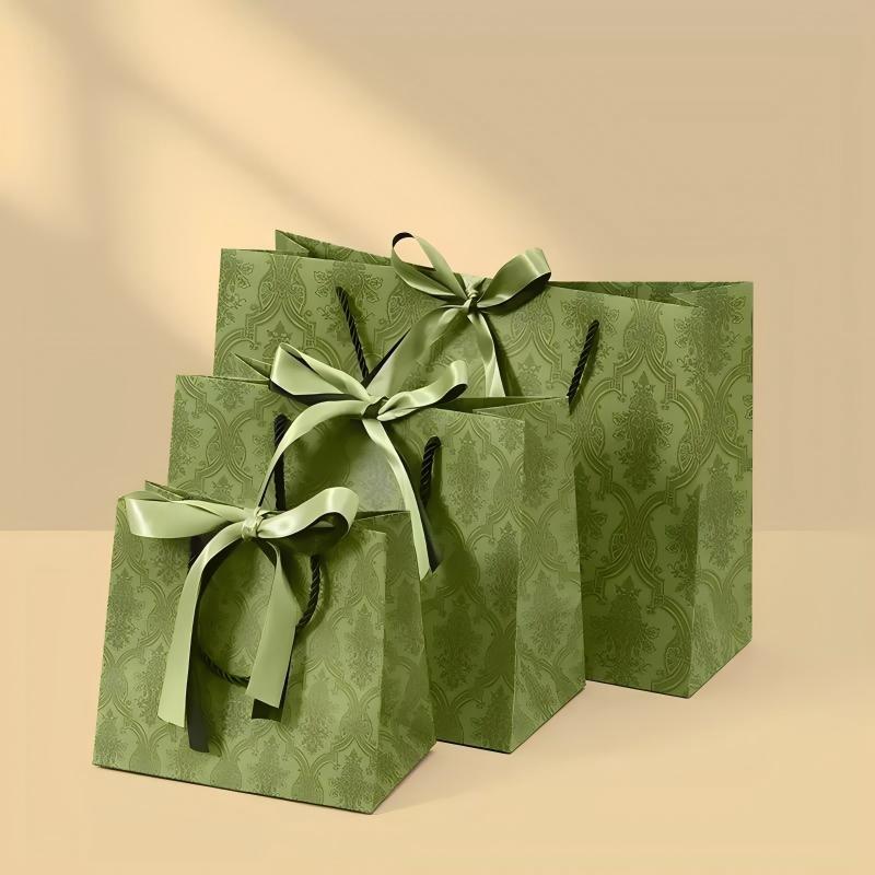 Vintage olive green patterned luxury gift paper bags with satin bow ribbon