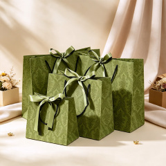 Vintage olive green patterned luxury gift paper bags with satin bow ribbon
