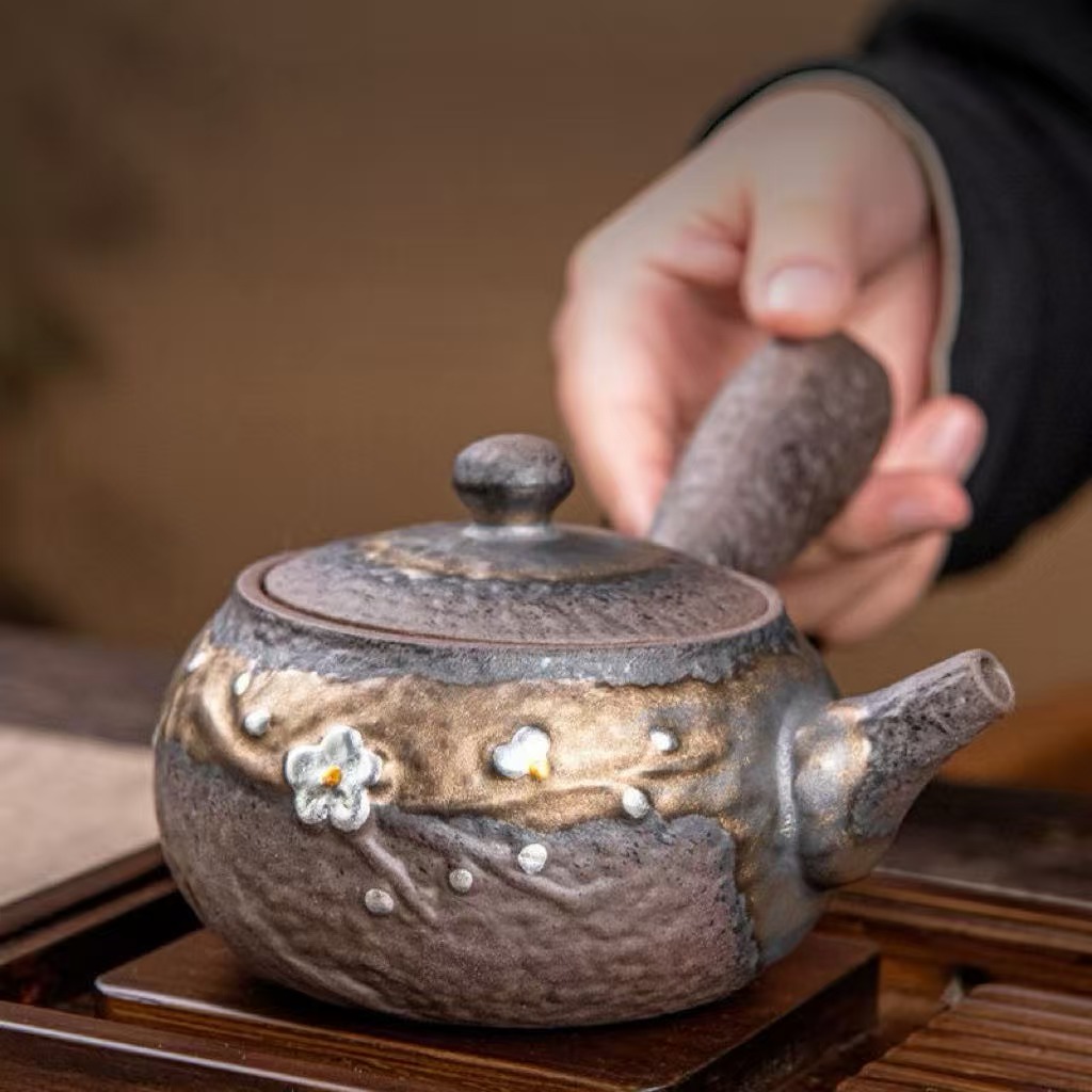 Hand‑thrown Rough Clay Side‑Handle Teapot, Vintage Ceramic Teapot with Embossed Plum Blossom & Gold Glaze for Tea Ceremony