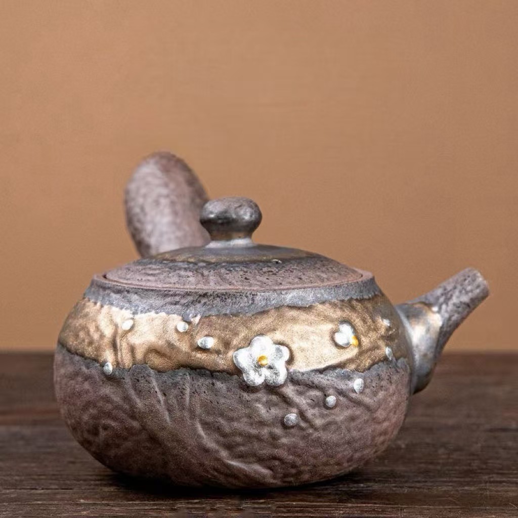 Hand‑thrown Rough Clay Side‑Handle Teapot, Vintage Ceramic Teapot with Embossed Plum Blossom & Gold Glaze for Tea Ceremony