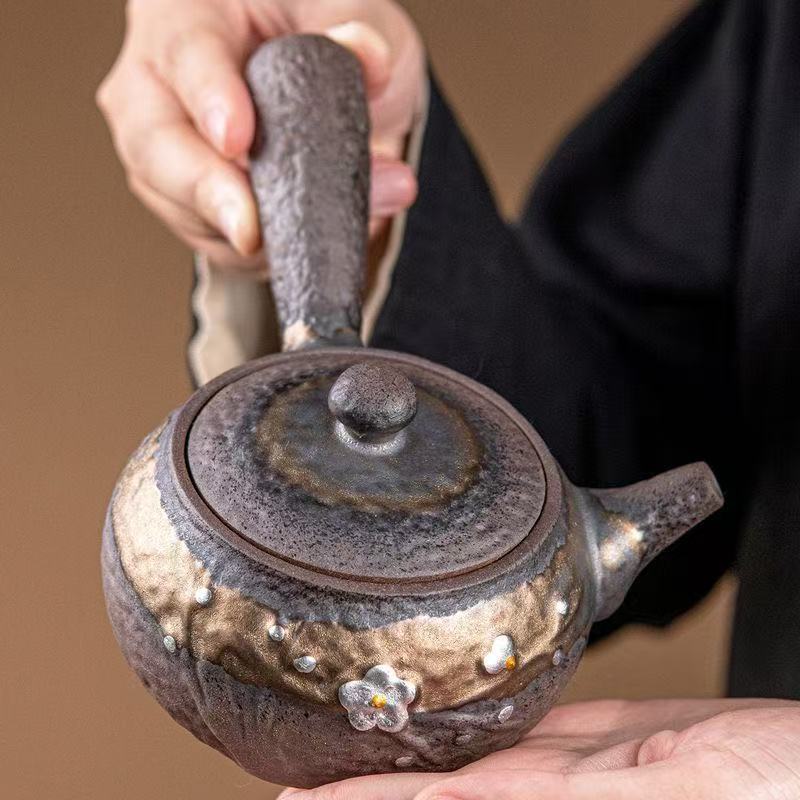 Hand‑thrown Rough Clay Side‑Handle Teapot, Vintage Ceramic Teapot with Embossed Plum Blossom & Gold Glaze for Tea Ceremony