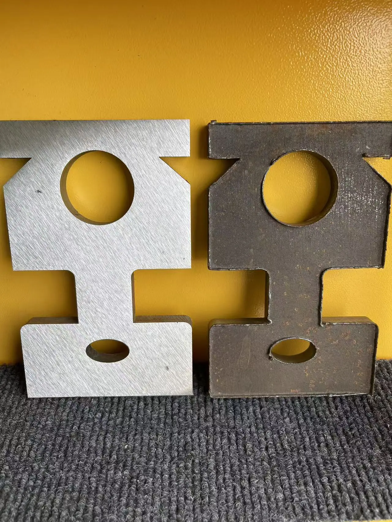 Structural heavy machinery component requiring edge finishing