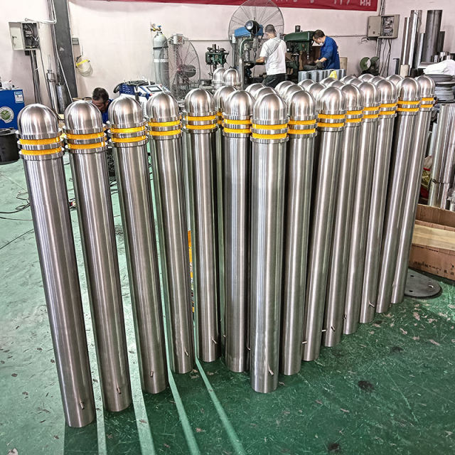 Side view of a Static steel road bollard featuring a modern Dome Top design