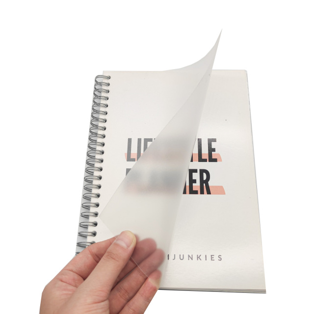 Carnet portable personnalisé à spirale métallique, reliure transparente en PVC imperméable avec papier kraft et papier d'art.