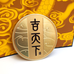 Circular black and gold color-blocked embossed metal wine label